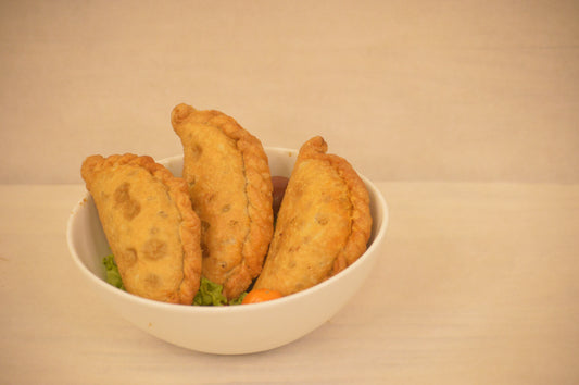 Beef Empanadas w/ chimichurri sauce